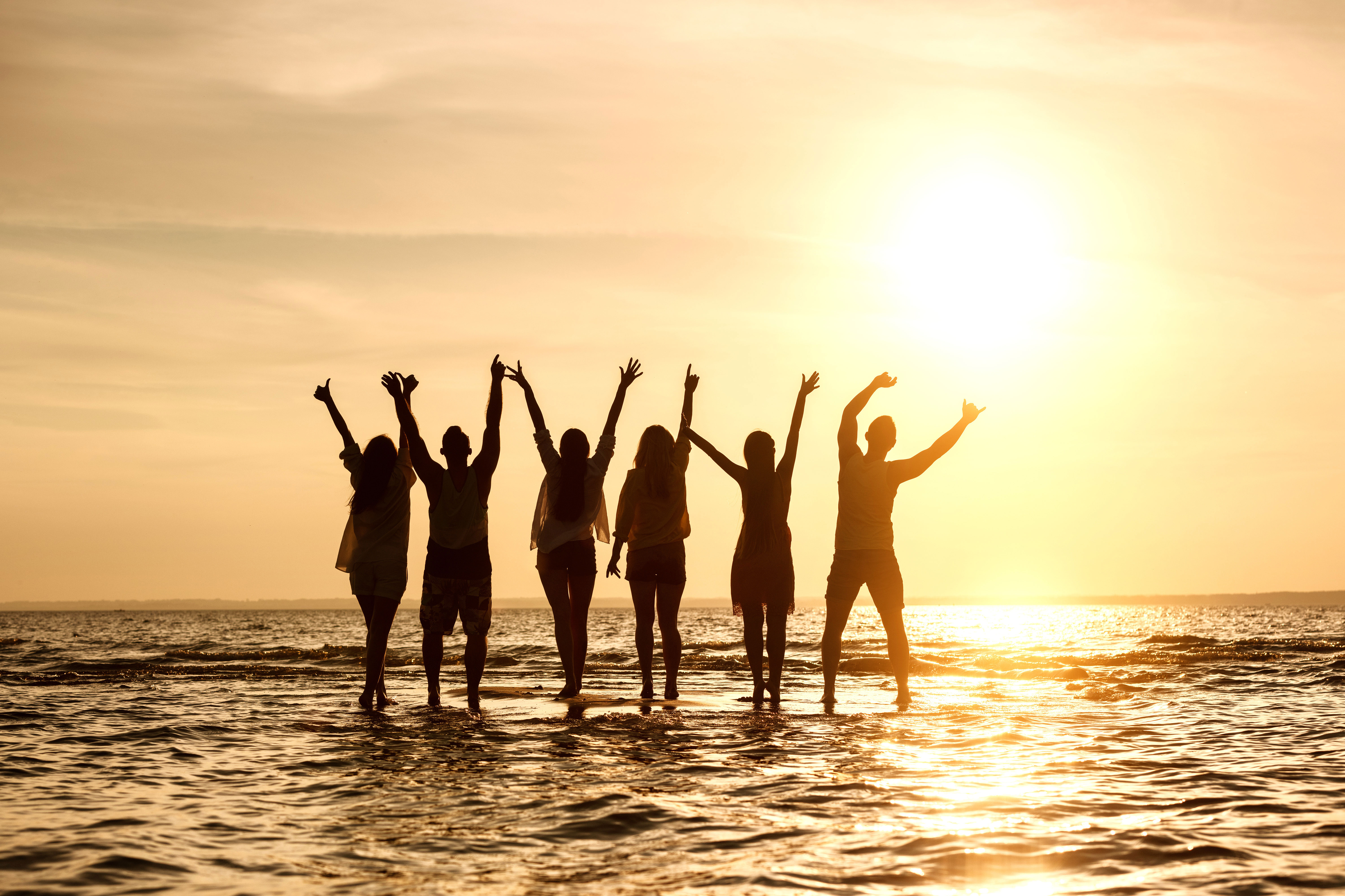 Group-beach-sunset